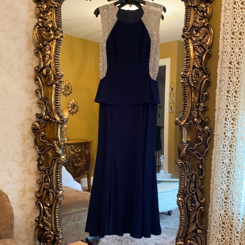 Woman’s Escape navy gown size 8